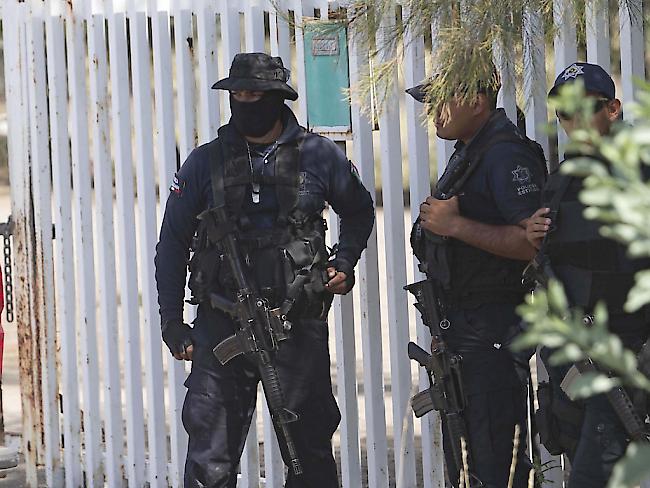 Mexikanische Bundespolizisten nach Feuergefechten mit dem Drogenkartell Neue Generation